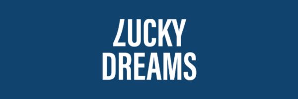 Lucky Dreams Casino promotional banner featuring a night sky theme and bonus spins offer